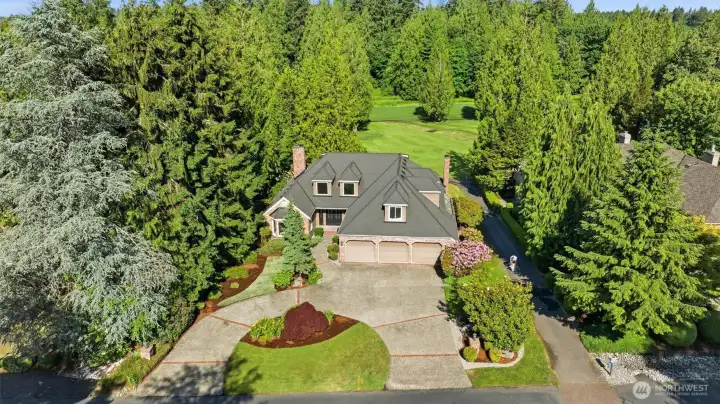 Stately curb appeal overlooking the championship golf course.