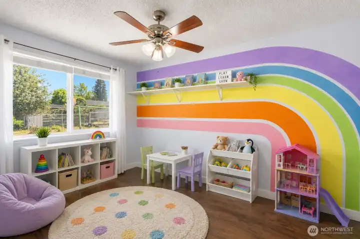 Virtually staged dining room used as play area Virtually staged dining room used as play area