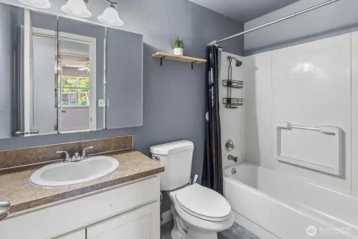 Full bath in hallway Full bath in hallway