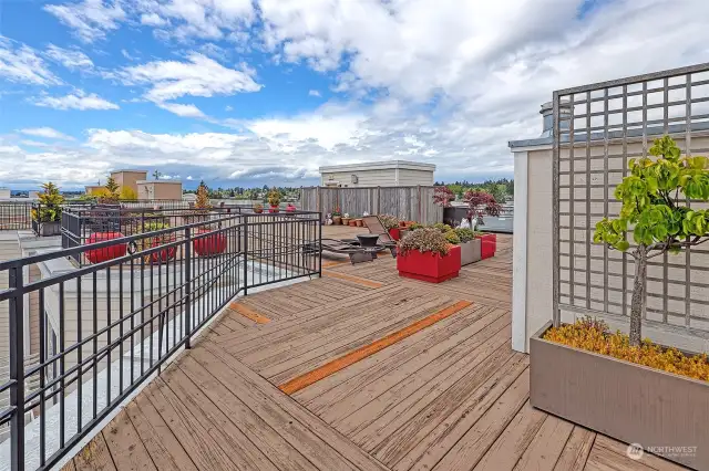 Many seating areas on the rooftop deck with beautiful views.