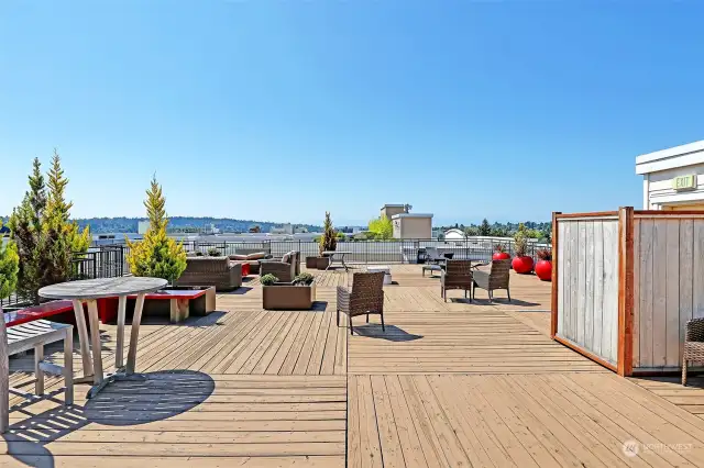 Many seating areas on the rooftop deck with beautiful views.