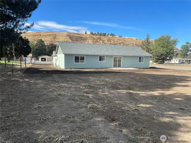 Grass is now green, back of lot has rooom for?