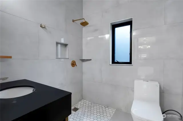 3/4 bath on main floor with wet room style shower.