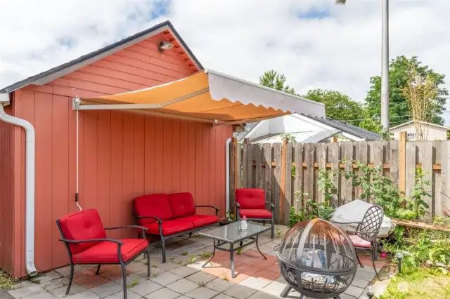 Back yard with retractable awning