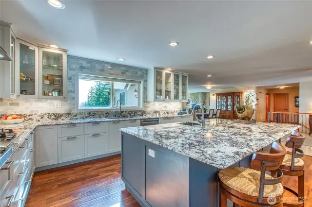 Kitchen island has storage pace and a great view straight out the kitchen window