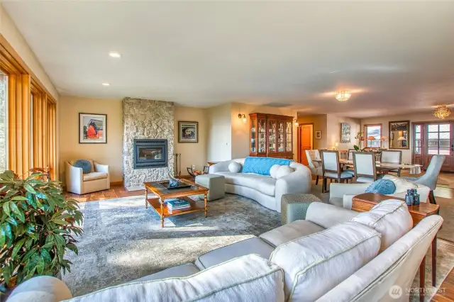 Large living room + dining area create plenty of entertaining options and space for friends