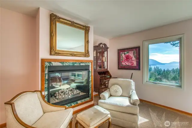 A propane fireplace warms up the primary bedroom on cool evenings. Entrance Mt and Blakley in the distance