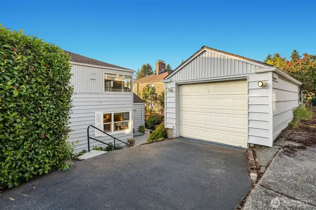 Detached garage looking to house.