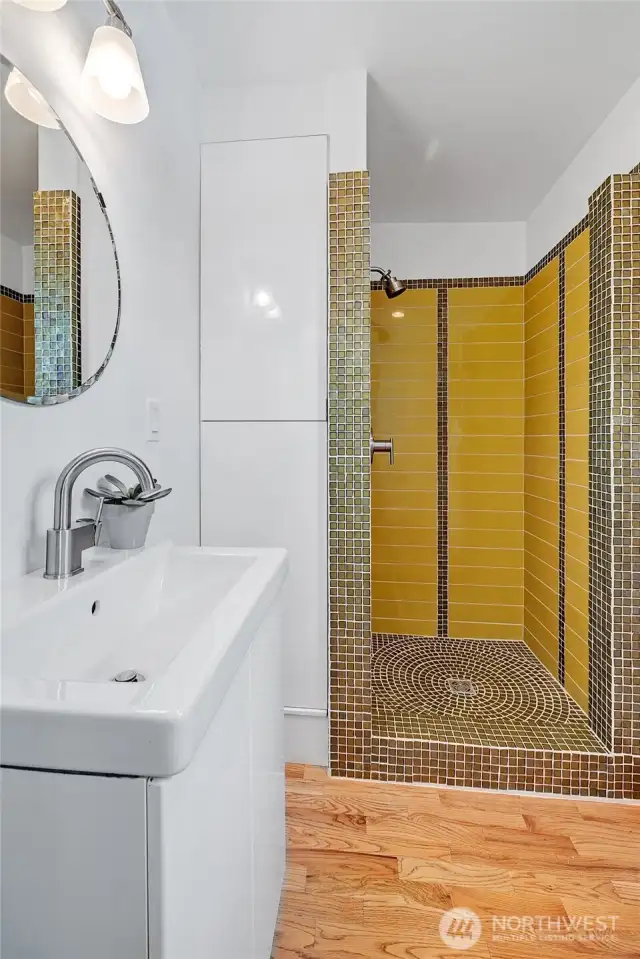 The 3/4 bath was updated in 2022 and features a super cool custom tile installation.
