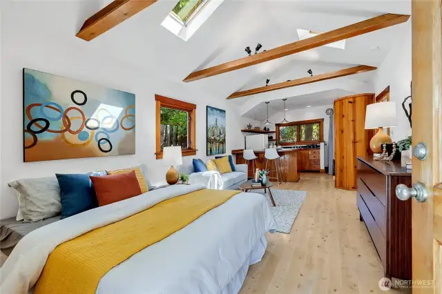 The custom DADU/studio cottage, mirrors the architectural details on the main home for a warm and wonderful continuity and design.
