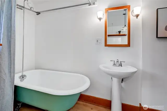 Newly refinished claw foot soaking tub makes for a relaxing and comfortable, bath-time to be cherished and enjoyed.