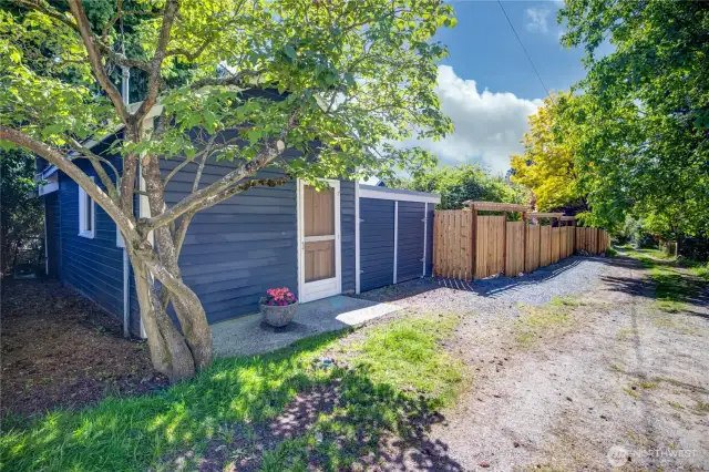 From the alley, the DADU has it's own private entrance as well as additional off street parking for 2-3 vehicles.  Note the length of the property and the expansive new fence which surrounds it.