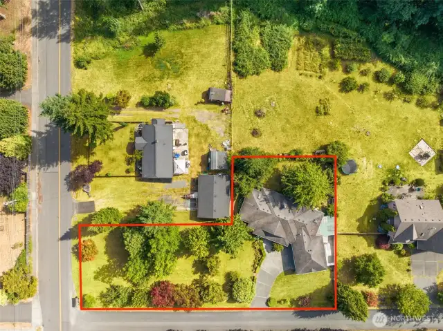 Corner lot presents exciting development possibilities. Property lines are approximate. Buyer to verify all info to their satisfaction.