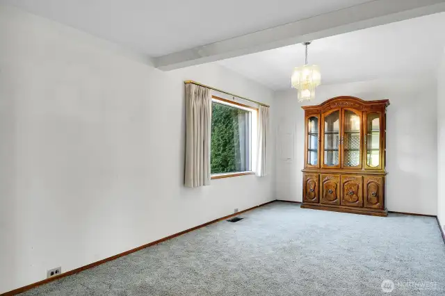Formal dining room and just off the kitchen and informal eating space.
