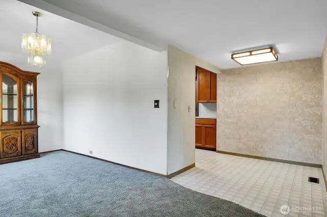 Formal dining room and just off the kitchen and informal eating space.