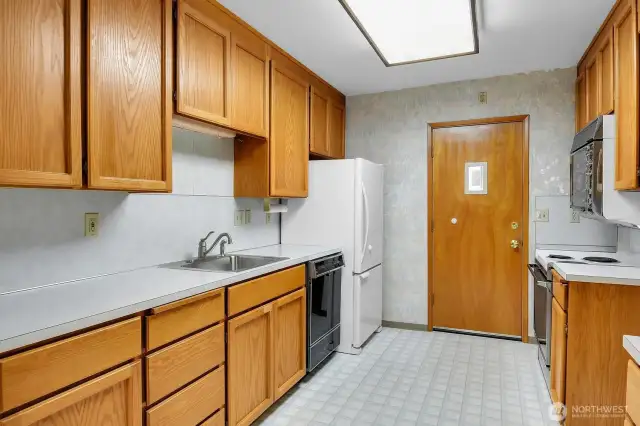 Back door leads to mud room/porch and outside to garage.