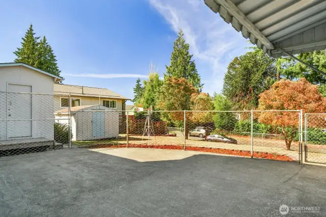 Large fully fenced patio off the living room sliding glass doors.