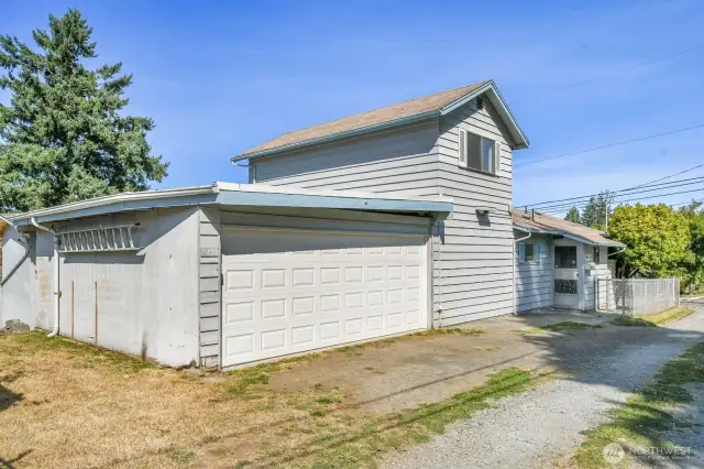 Alley access to large two car garage with additonal off street RV/Boat parking