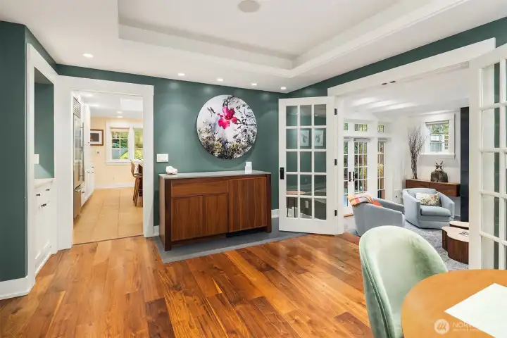 Dining room leads to the den