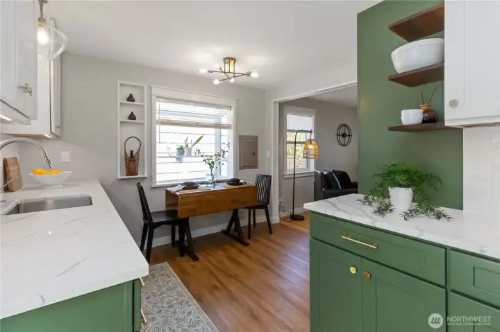 Charming dining nook just off the kitchen, filled with natural light and a cozy space for everyday meals.