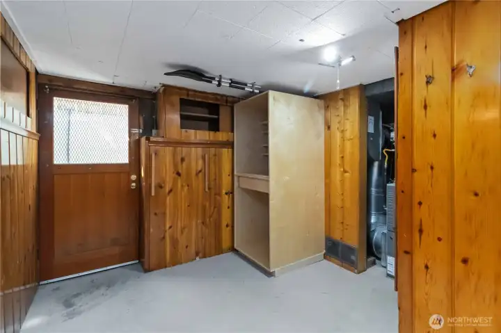 This storage room offering built-in shelving and ample space to keep belongings organized.