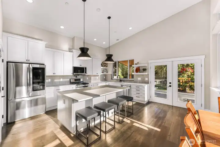 Custom Chefs kitchen with covered deck access to BBQ and entertain