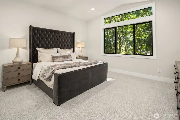 Designer primary suite with five-piece bath & heated floors