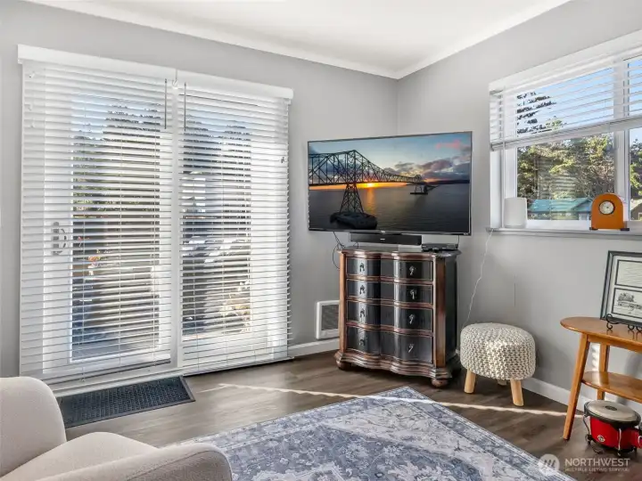 Bedroom #1 is currently being used as a family room with sliding door providing access to the deck