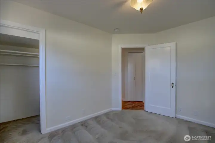 The first main floor bedroom at the back of the home.