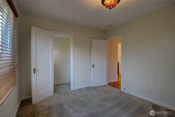 The second main floor bedroom on the front of the house.