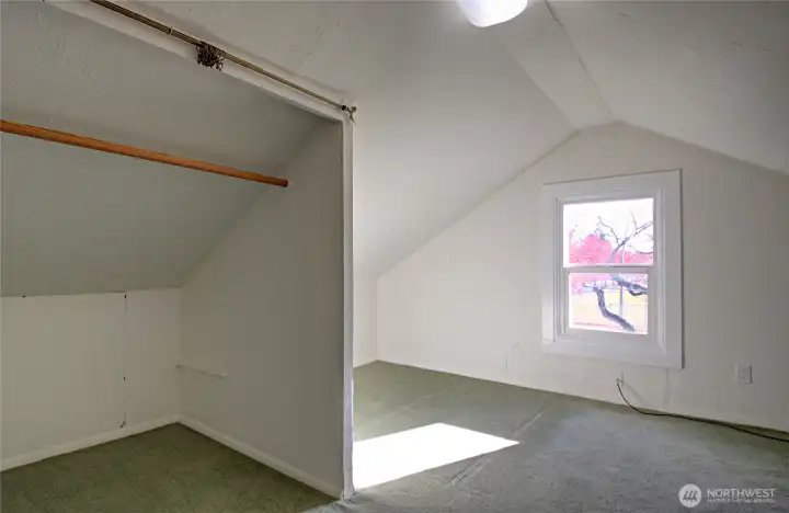 Upstairs closet space. Window facing the park.