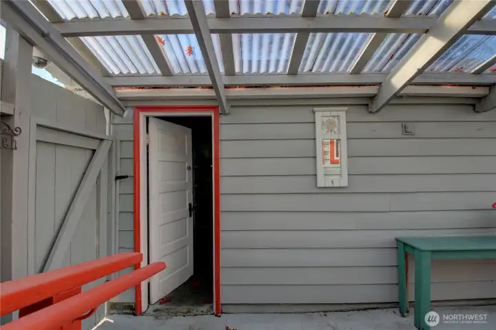 Standing at the back door looking at the garage.