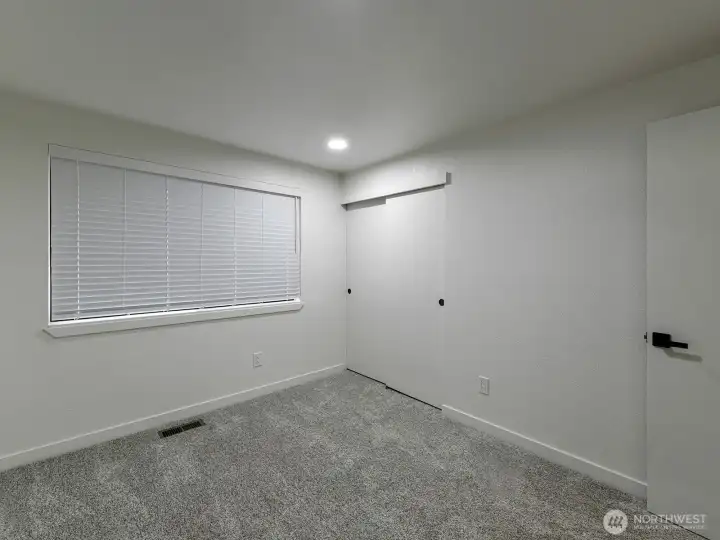 3rd Bedroom . New carpet and blinds.