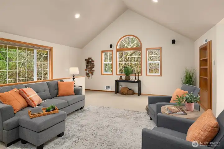 Super large bonus room with vaulted ceilings and secret "hidden door" storage spaces!