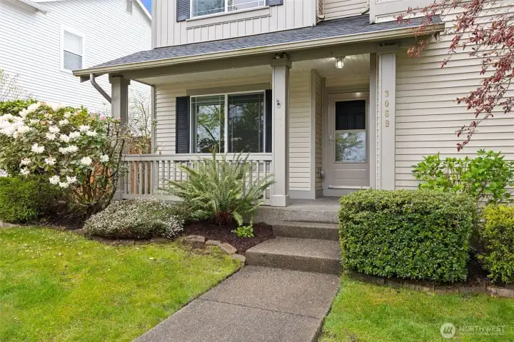 Enjoy serene view from front porch. Plenty of on street parking plus garage.