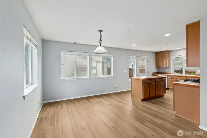 Large designated dining space adjacent to the kitchen. Lots of natural light.