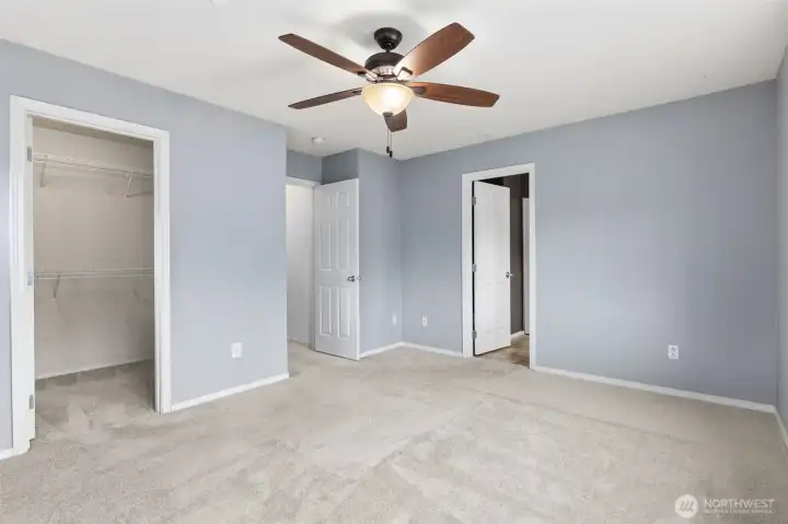 Walk in closet and attached bath on primary suite.