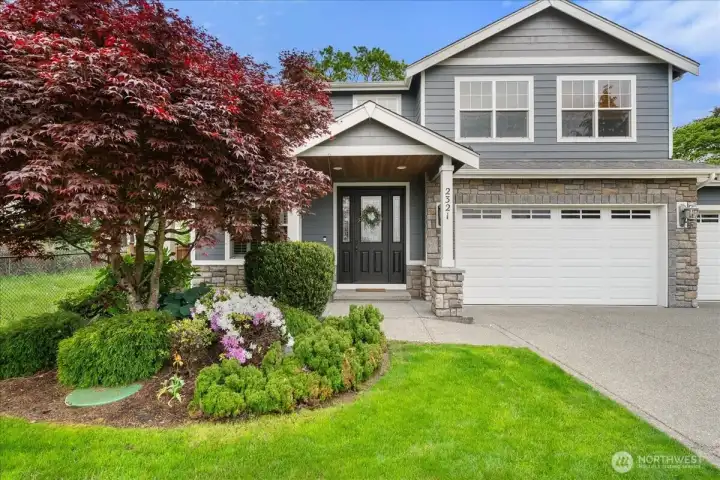 The landscaping is beautifully mature, lush, and is very peaceful.