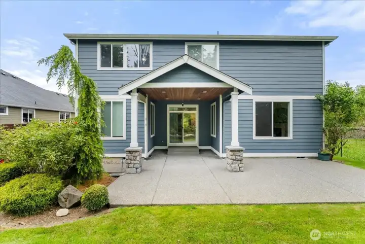 A wonderful spacious patio with a great covered area with overhead lighting.
