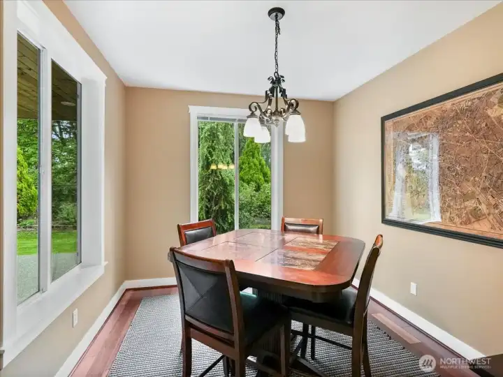 This is the cozy kitchen eating area which is so light and bright.