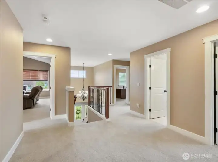 Now your upstairs!  This is the spacious landing area.  You are looking at the theater/bonus room, bedrooms, main bath, upstairs laundry room.