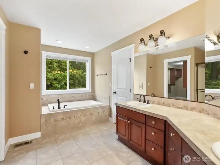 Such a wonderful spa like feeling in this primary bath.  So pretty and spacious.