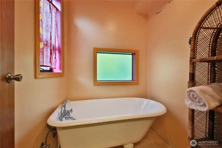 Enjoy privacy from the bath that is located in it's own space.