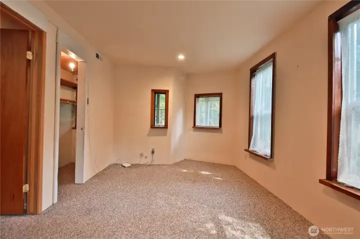 The bedroom offers plenty of space and could be used as a multipurpose room.