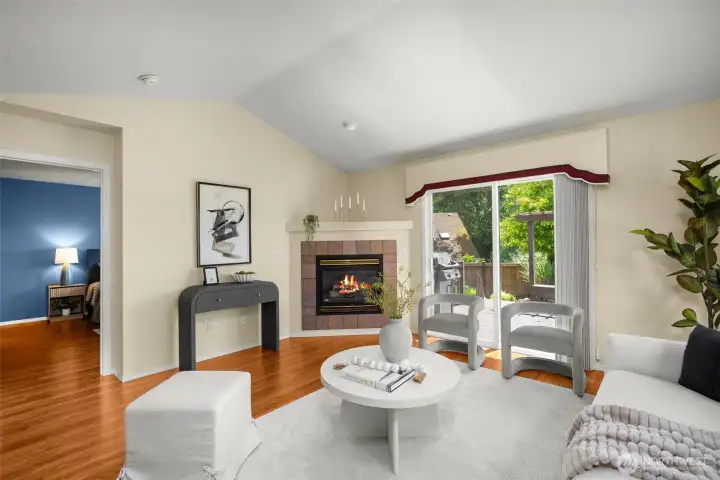 Living room features a cozy gas fireplace Living room features a cozy gas fireplace