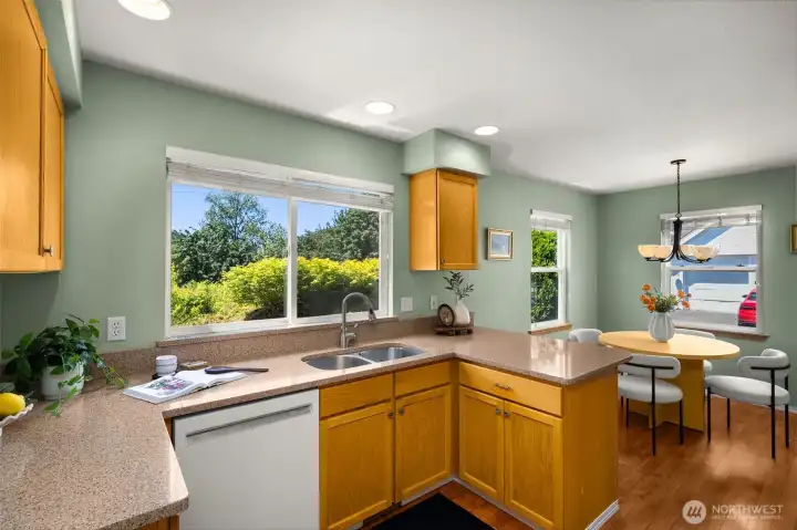 Kitchen and breakfast nook with bar top seating Kitchen and breakfast nook with bar top seating