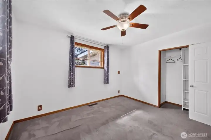 Another view of bedroom 1 which features a ceiling fan! Another view of bedroom 1 which features a ceiling fan!