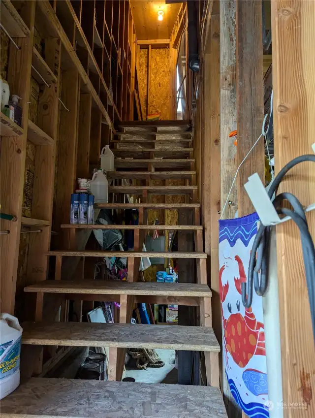 Staircase in garage leading to 2nd level
