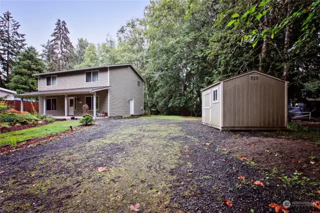 Large driveway and shed to store your items.