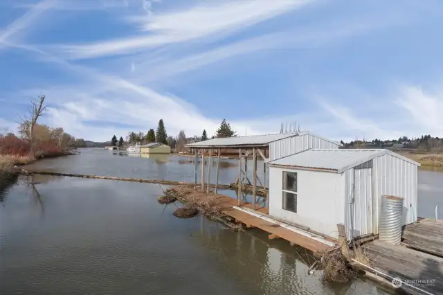 View down the slough. The boathouse has been removed.